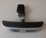 Waga ręczna elektroniczna z termometrem, bagaż, lotnisko