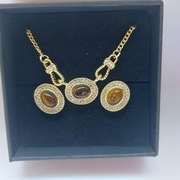 Piękny kpl biżuterii z tygrysim oczkiem projekt Leo Bernarda