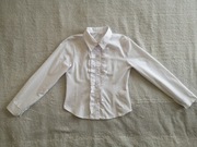 Biała elegancka koszula długim rękawem z żabotem falbankami 146 jak nowa