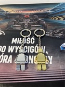 Dwa oryginalne breloczki Lego złoty i srebrny