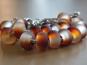 Komplet dwóch bransoletek w beżowo-brązowej totacji