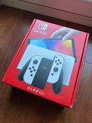 Nintendo Switch OLED (4 - joy-con) + etui Zelda (polska dystrybucja)