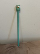 Ołówek z drewnianą głową zwierzęcia.