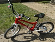 Zadbany WOOM 3 Automagic 16” czerwony + podpórka, koszyk, nowe hamulce