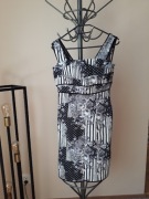 Elegancka sukienka przed kolano sza wizytowa M na ramiączkach