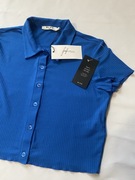 Stylowy krótki kardigan od NA-KD x Josefine Simone – rozmiar M