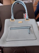 BESSIE Niebieska torebka ze złotymi elementami. 