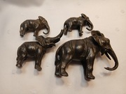 Słonie z metalu,rodzina słoni, cztery sztuki,nie są pełne w środku. 