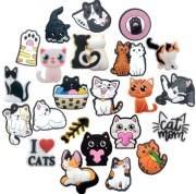 Przypinki do butów typu crocs charms piny zawieszki ozdoby kotki 23 szt