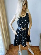 Czarna sukienka Sinsay z uroczym wzorem piesków M rozkloszowana mini casual