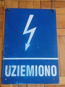 Tabliczka ostrzegawcza / znak BHP "uziemiono" prąd