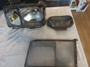 Mercedes W124 reflektor lewy org. Żółty klosz