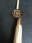 Breloczek do torebki River island.