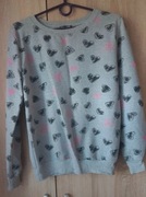 Szary sweterek w serduszka 