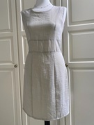 Beżowa sukienka princeska dopasowana taliowana elegancka