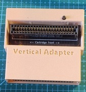 Adapter kątowy do Commodore wyposażony w przycisk reset