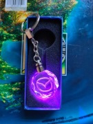 Brelok LED wielokolorowy, szklany Mazda