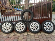 Aluminiowe felgi OEM 14"+ opony zimowe do Mitsubishi Mirage / Space Star II