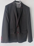 Czarny męski garnitur czerwone przeszycia slim 46