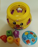 Garnuszek muzyczny firmy Fisher Price