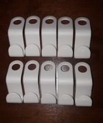 Nowe plastikowe zaczepy na wieszaki jeden komplet=10sztuk, kolor biały