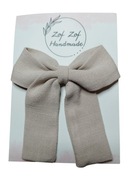 Elegancka duża beżowa kokarda