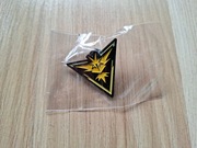 Pokemon GO przypinka Team Instinct – oficjalny pin Gamescom 2025