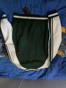 Bejsbolówka biało zielona mało używana.