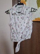 Piękna koszula krótka wiązana w pasie na guziki w kwiatki delikatne fiolet