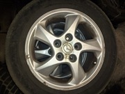 KOŁA OPONY FELGI ALU.15" MAZDA ORG. KPL. 4 SZT.