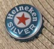 Kapsel Heineken butelkowane