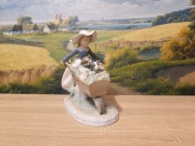 LLADRO 5460 porcelanowa figurka dziewczynki z taczką pełną kwiatów 