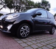 Opony zimowe felgi stal 14 Renault Twingo II + kołpaki