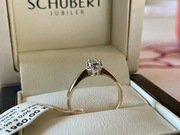 Złoty pierścionek zaręczynowy 585 z brylantem 0,06 ct + certyfikat (rozm12)