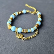 Bransoletka handmade z kamieni - tygrysie oko –  z kwiatową zawieszką