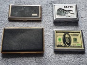 Cztery metalowe papierośnice.