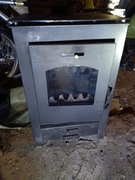 Kominek , piec z płaszem wodnym ,,BLIST" 25 kw