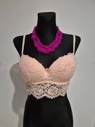 Biustonosz pudrowy róż koronkowy push up Tezenis