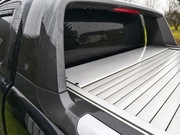 Oryginalna elektryczna roleta paki Ford Ranger Wildtrack 22-26 + skrzydło