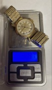 Złoty zegarek Movado 14k próba 0.585 ( waży 56.8 gramów )