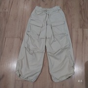 Modne beżowe spodnię H&M dla dziewczynki rozm 146