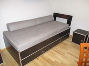 Nowoczesne łóżko czarne VOX z wygodnym materacem