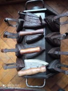 Stary piec do podgrzewania żelazek wraz z 12 szt. żelazek.