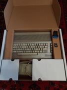 C64 szary w nowej obudowie, nowym kartonie, Tapecart z grami