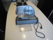 TCM 225041 krajalnica do chleba wędlin  130W   metalowa