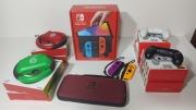 Nintendo Switch OLED + etui + kierownice + gripy - duży zestaw