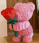 Różowy miś z róża