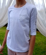 Biała elgancka koszulka 140