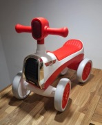 Carotina Baby Jeździk z grami. Okazja!