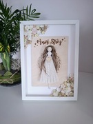 Anioł stróż w ramce z kwiatami